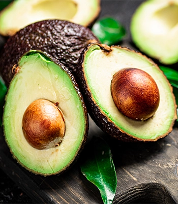 Close-up of fresh green avocados from Colombia.